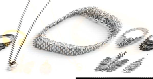 Group lot of Vintage 925 sterling silver jewelry: Group lot of Vintage 925 sterling silver jewelry. rings, 2 charm pendants, Pearl pendant on box chain necklace and cubic zirconia tennis bracelet. The total weight of the lot is 36.10 grams.