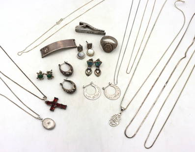 Group lot of Vintage 925 sterling silver mixed jewelry: Group lot of Vintage 925 sterling silver mixed jewelry. 3 Pendants on chains. 5 Chains, 5 pair of earrings. Ring and tie bar. The total weight of the lot is 75.79 grams.