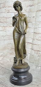 Young lady Gazes into a Flower Bronze Sculpture