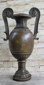 Elegant Bronze Vase Sculpture