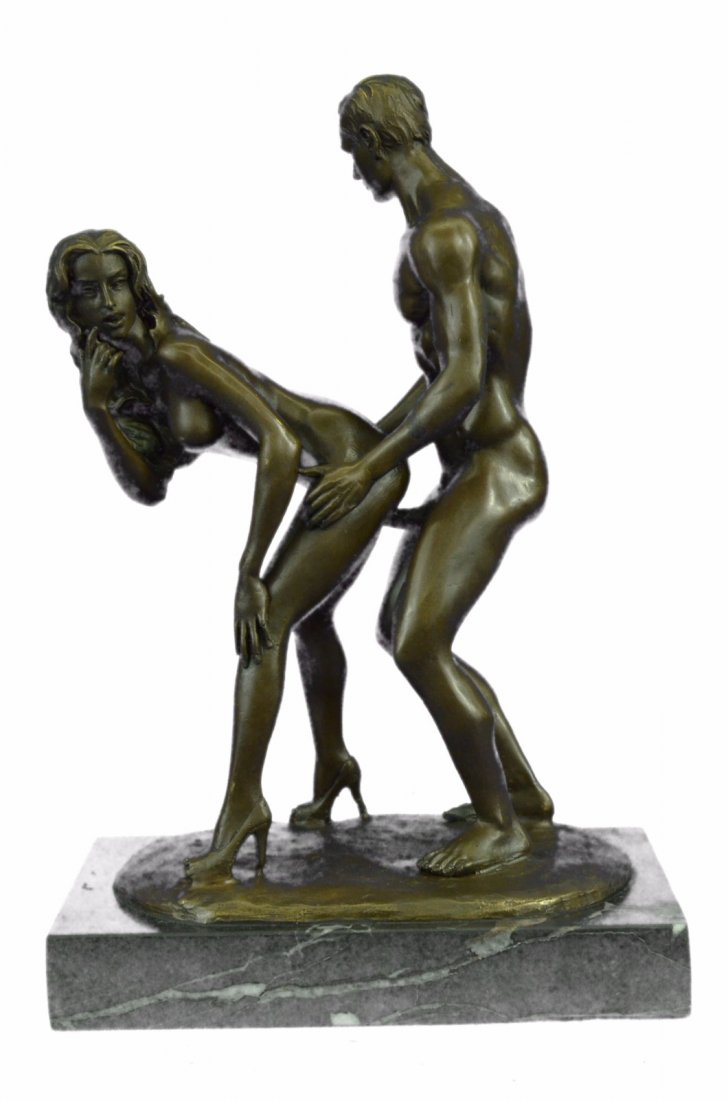 Bronze Sculpture By Italian Artist Mavchi on marble: This Erotic Sculpture Is An Exquisite Piece Of A Interracial Couple In A Very Evocative Pose. The Female Is Sensually Touching The Front Of Her Face As She Standing And Receiving Pleasure From Her Lov
