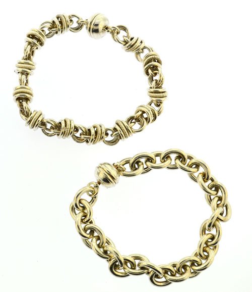 group lot of sterling silver multi link bracelets: group lot of two sterling silver 925 multi link bracelets with magnetic clasp. 35 grams.