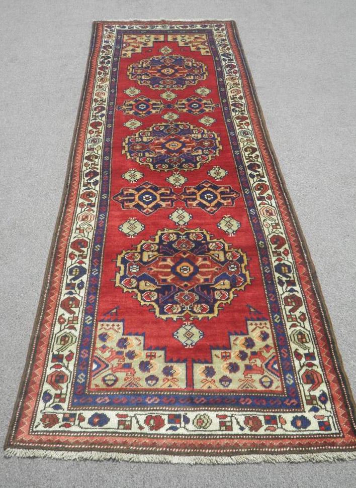 Semi Antique Persian Heriz 3.6x10.4: Handmade semi antique Persian Heriz runner. Size 3.6x10.4 ft, made of high quality baby lambs wool pile on cotton foundation, all natural vegetable dye, incorporating incorporating a floral pattern on