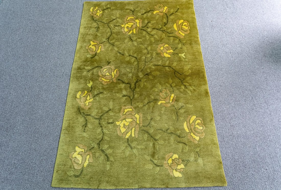 Handmade Nepal 3.9x5.9: Handmade Nepal Rug. Size 3.9x5.9 ft., made of quality wool pile on cotton foundation, finished off beautifully with a floral borders. Hand woven in Nepal.