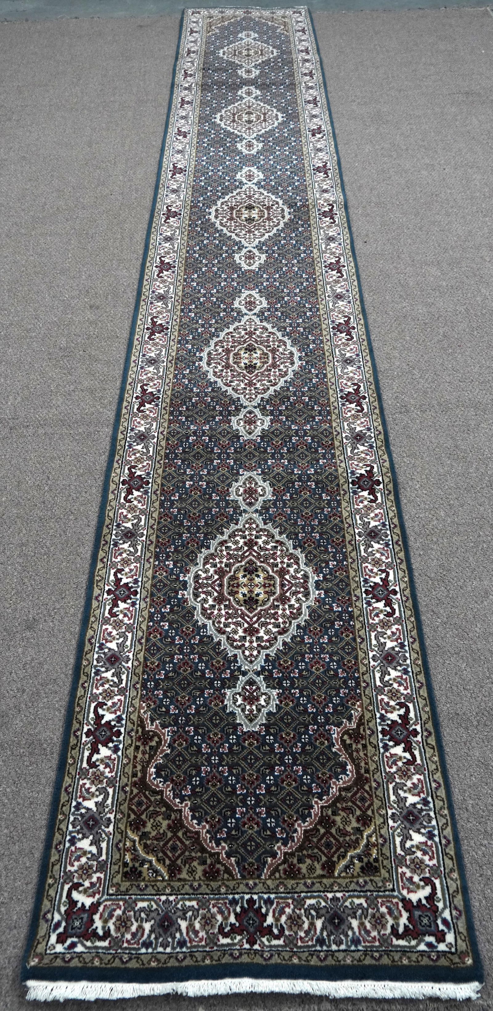 Handmade Tabriz Fish Design 2.6x16.0: Handmade Tabriz Fish Design Rug. Size 2.6x16.0 ft., made of quality wool with silk highlights pile on cotton foundation, finished off beautifully with a floral borders. Hand woven in India.