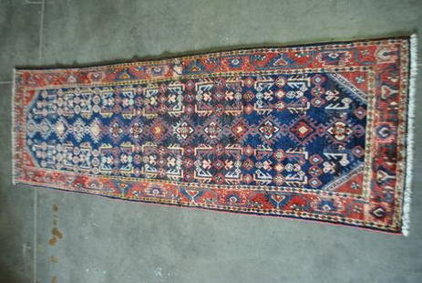 Beautiful Handwoven Nahavand Design Semi-antique Runner: Beautiful hand woven Nahavand design semi-antique Persian runner. Size 10.6 X 3.4 feet, color blue, red - multi-colored knot technique 100% hand knotted rug foundation cotton pile 100% fine wool. Made