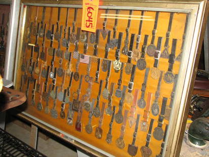 ANTIQUE WATCH FOBS IN GLASS DISPLAY CASE, APPROX: ANTIQUE WATCH FOBS IN GLASS DISPLAY CASE, APPROX 85 FOBS