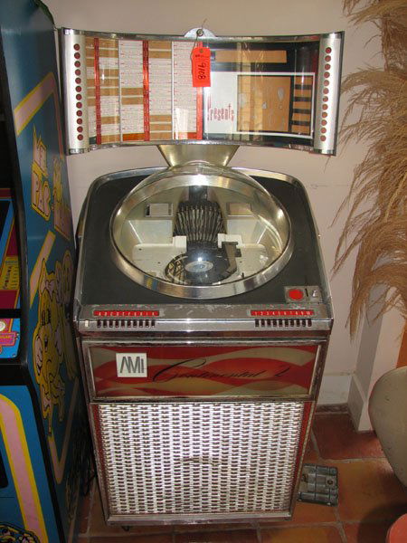 AMI JUKEBOX; PLAYS 45 CONTINENTAL TWO MODEL WITH: AMI JUKEBOX; PLAYS 45 CONTINENTAL TWO MODEL WITH RECORDS