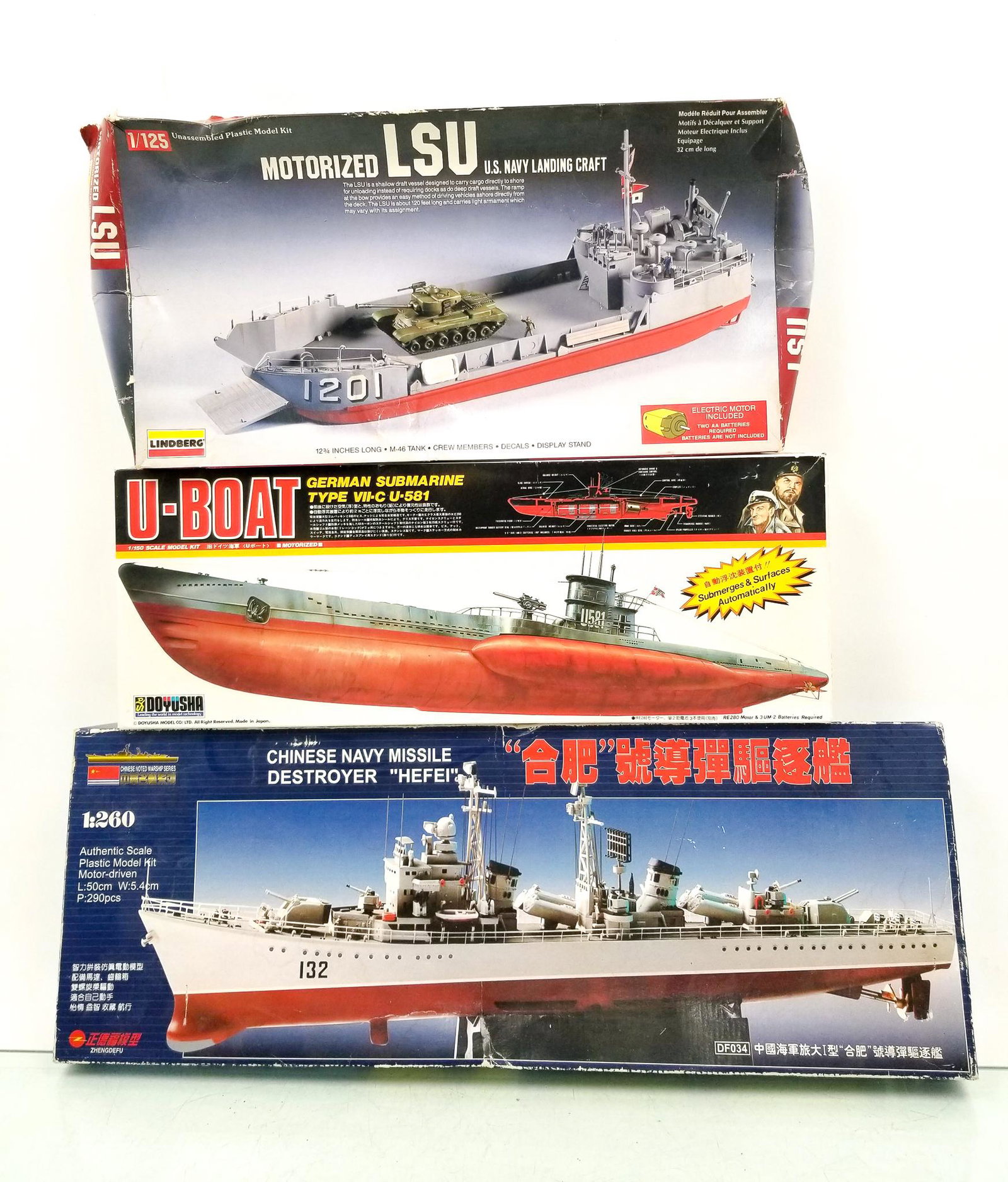Three Naval Scale Models: (3) Naval Scale Models: Lindberg motorized LSU Navy landing aircraft - Boyusha U-Boat German Submarine Type VII-C U-581 - Zhengdefu Hefei destroyer Literature Brooks Auction is not responsible for out