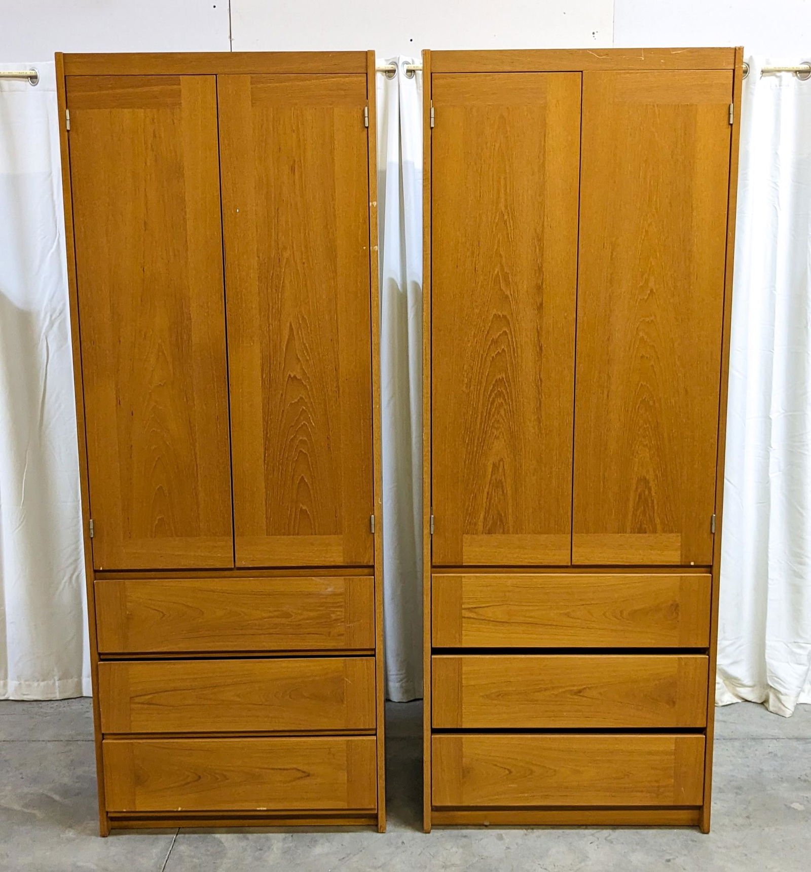 Pair of Teak Wood Armoires: Pair of Teak Wood Armoires Size 80" x 30" x 18" Literature Brooks Auction is not responsible for outbids. Questions? Call the office at (856) 694-2960 or email us directly at info@brooks.auction.