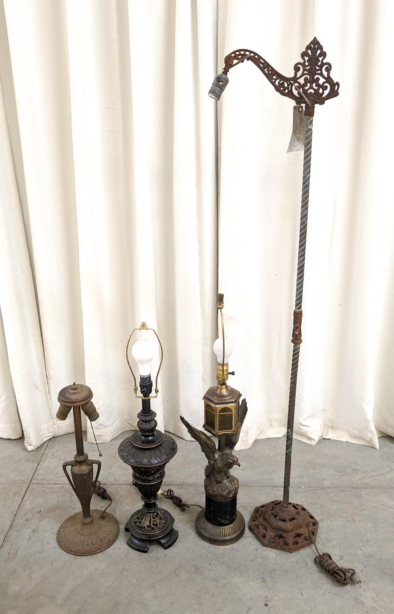 Four Lamps: Four Lamps: antique iron floor lamp - table lamp with eagle - dual headed table lamp - brown resin lamp Size 58" Literature Brooks Auction is not responsible for outbids. Questions? Call the office
