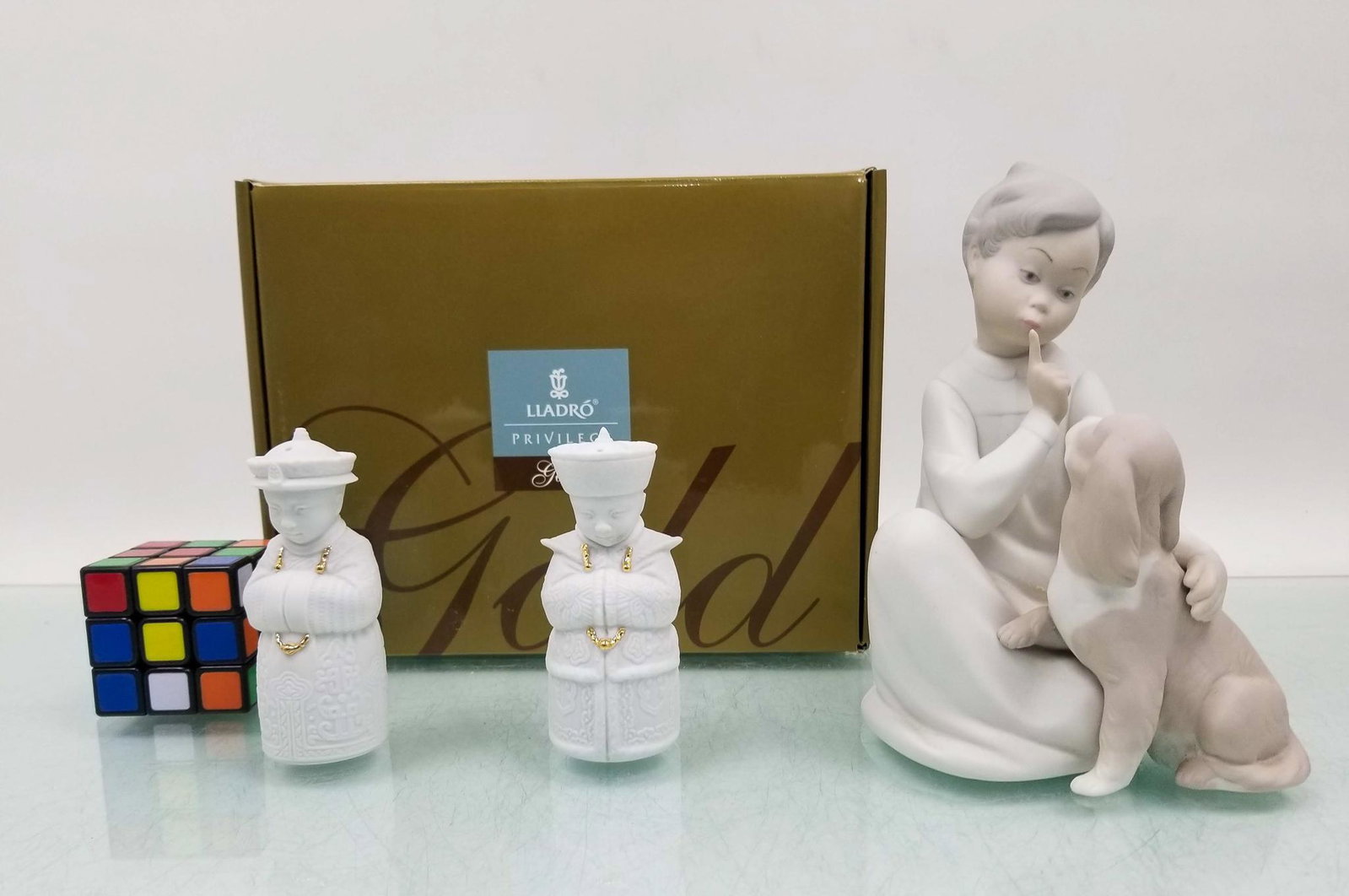 Lladro: Satin Boy with Dog - Emperors Table Salt and Pepper, Privilege Line: Lladro: Satin Boy with Dog - Emperors Table Salt and Pepper, Privilege Line Size 7.5"H Literature Brooks Auction is not responsible for outbids. Questions? Call the office at (856) 694-2960 or email