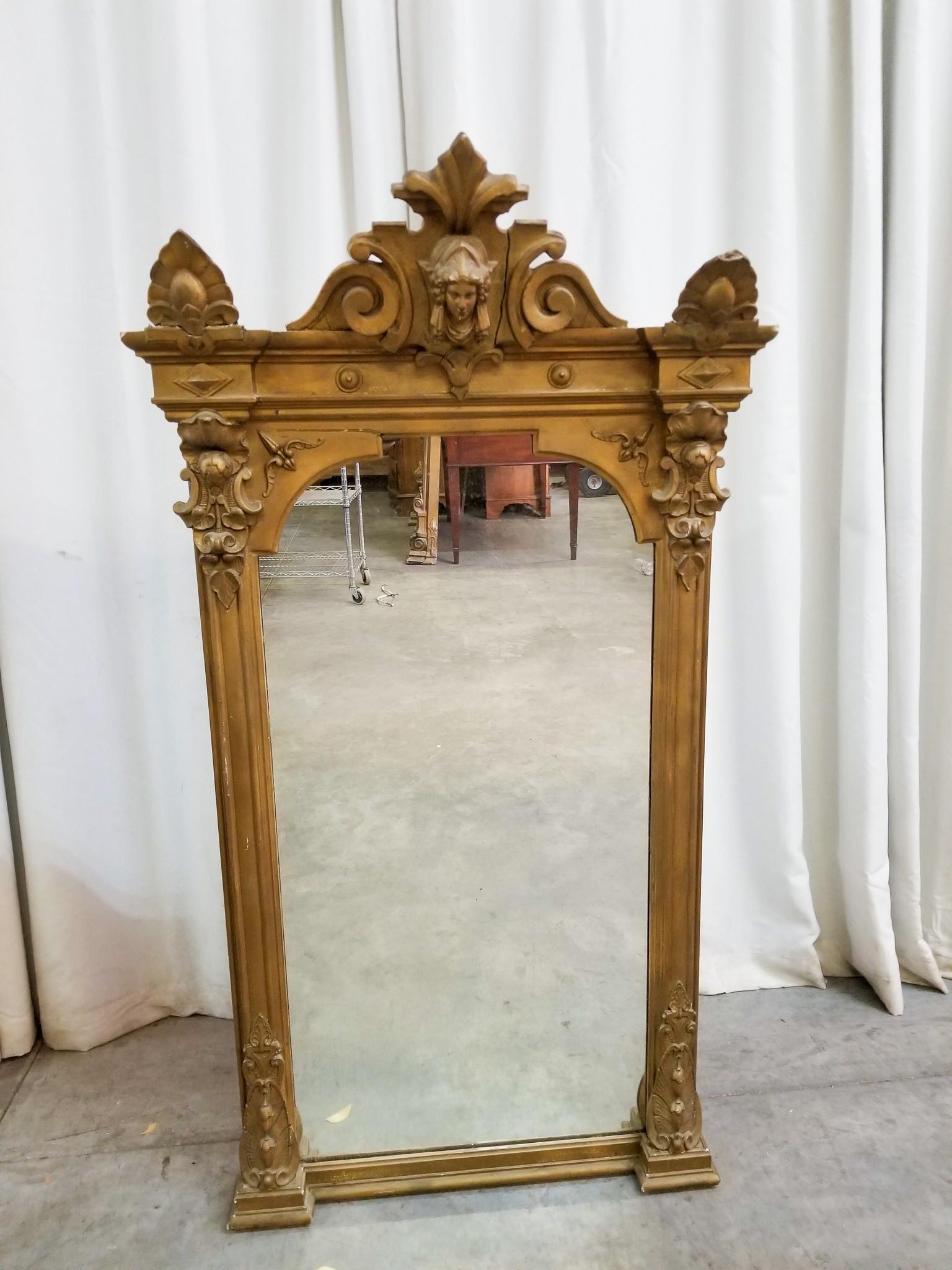 Gold Painted Art Deco Mirror: Gold Painted Art Deco Mirror Size 54" x 29" x 7" Literature Brooks Auction is not responsible for outbids. Questions? Call the office at (856) 694-2960 or email us directly at info@brooks.auction.