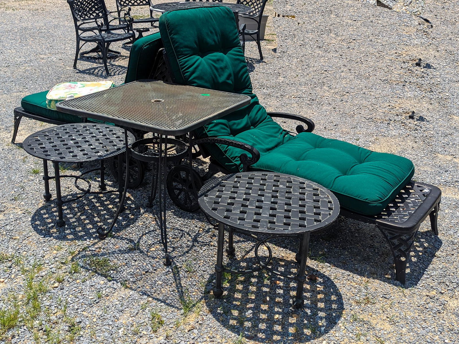 Five Pieces of Outdoor Furniture: Five Pieces of Outdoor Furniture: two metal recliners with green cushions - square mesh table - two small side tables Literature Brooks Auction is not responsible for outbids. Questions? Call the off