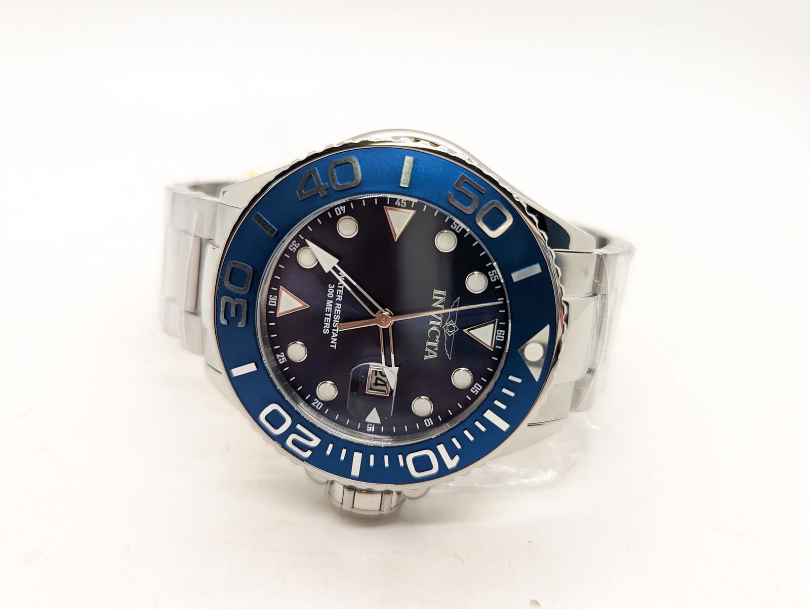 Invicta Pro Diver Men's Watch in Case: Invicta Pro Diver Men's Watch in Case, model 28766 with Swiss Quartz movement and instruction manual, NIB Literature Brooks Auction is not responsible for outbids. Questions? Call the office at (856)