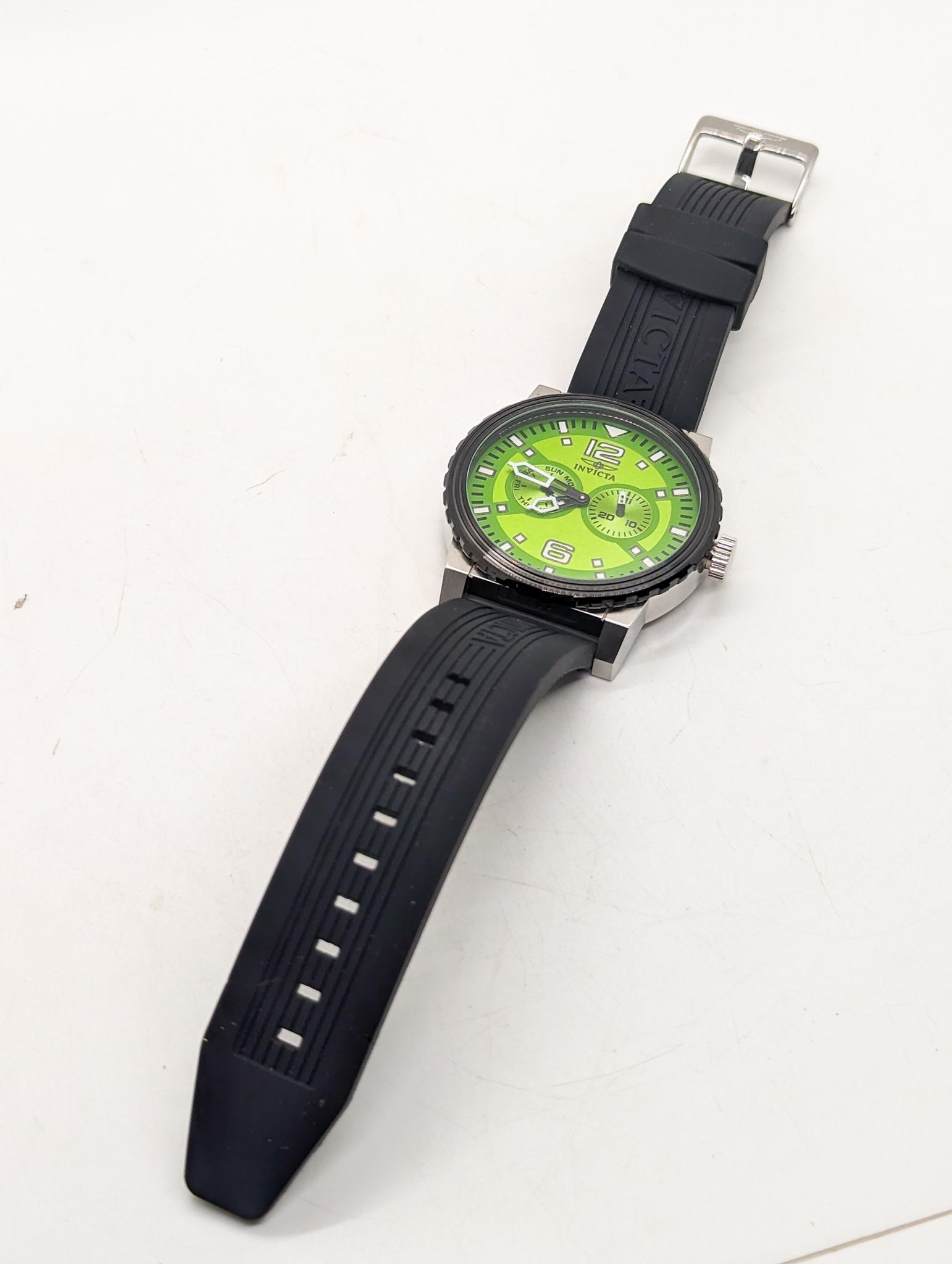 Invicta Specialty Men's Watch: Invicta Specialty Men's Watch, model 13645, Japan movement, green face Literature Brooks Auction is not responsible for outbids. Questions? Call the office at (856) 694-2960 or email us directly at i