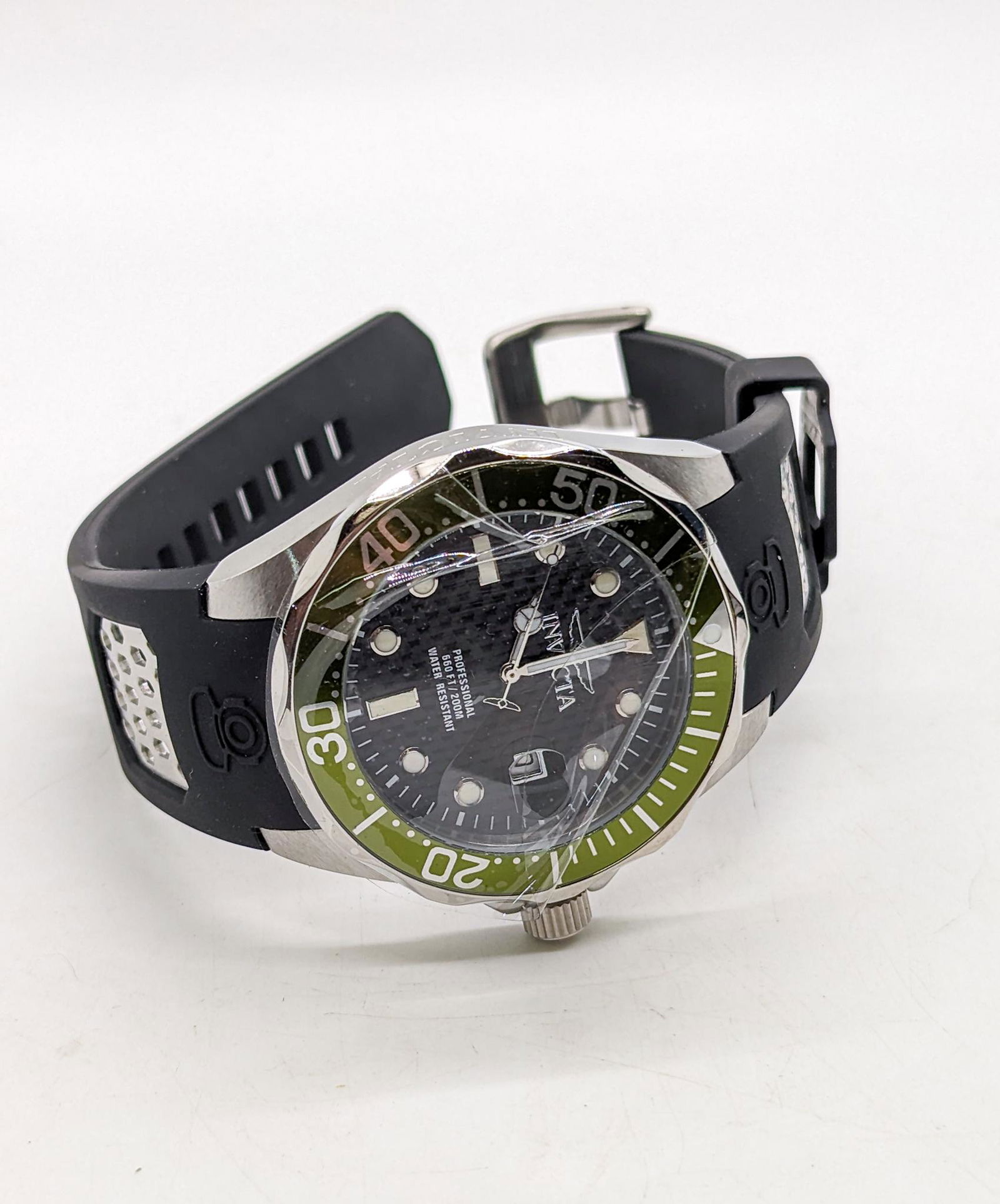 Invicta Pro Diver Men's Watch: Invicta Pro Diver Men's Watch, model 12560, Japan Quartz movement, 200M water resistant Literature Brooks Auction is not responsible for outbids. Questions? Call the office at (856) 694-2960 or email