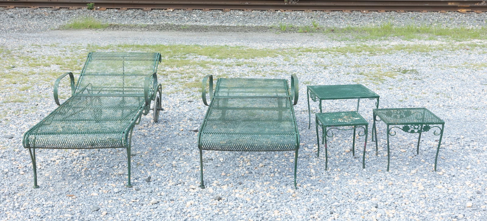 Five Pieces of Wrought Iron Mesh Green Outdoor Furniture: Five Pieces of Wrought Iron Mesh Green Outdoor Furniture: pair of wrought iron mesh green adjustable recliners - three wrought iron mesh green side tables Literature Brooks Auction is not responsible