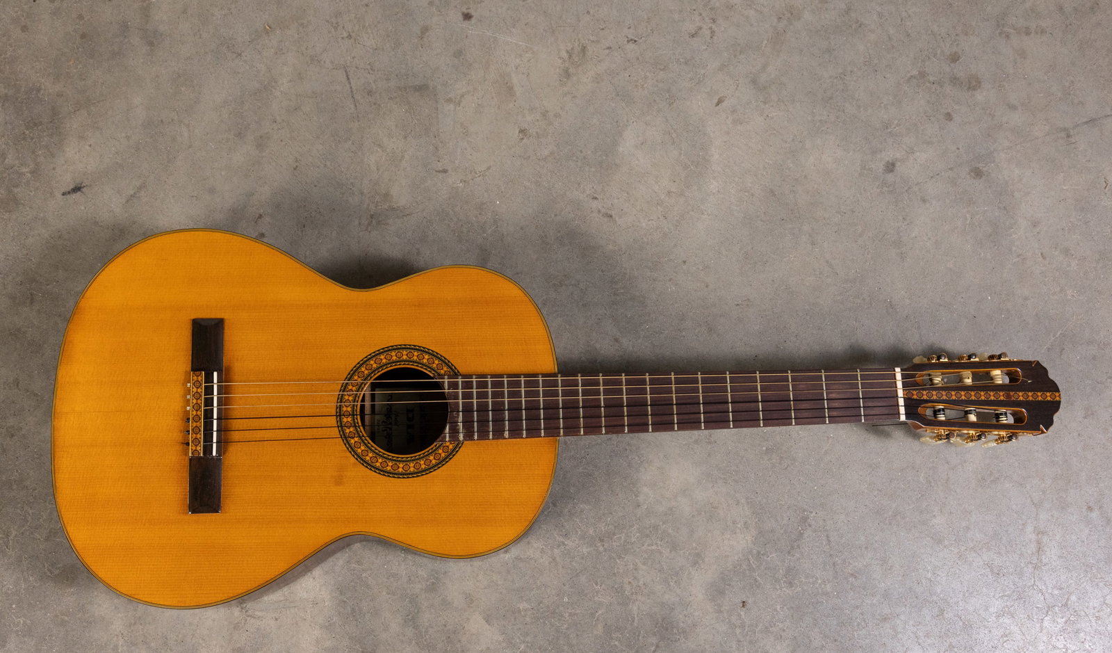 Dia Japan Acoustic Guitar in Case: Dia Japan Acoustic Guitar in Case Size 41" x 16" x 5" Literature Brooks Auction is not responsible for outbids. Questions? Call the office at (856) 694-2960 or email us directly at info@brooks.aucti