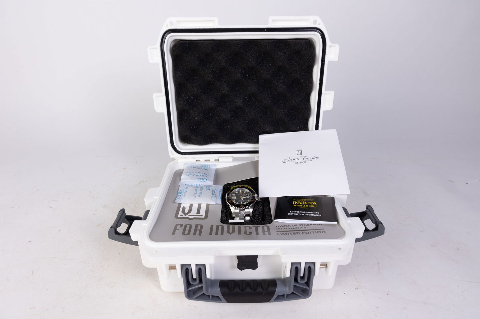 Jason Taylor for Invicta Men's Watch in Hard Case: Jason Taylor for Invicta Men's Watch in Hard Case, model #30194, stainless steel, Japan automatic movement, 300m water resistance Size 10" x 12" x 6" Literature Brooks Auction is not responsible for