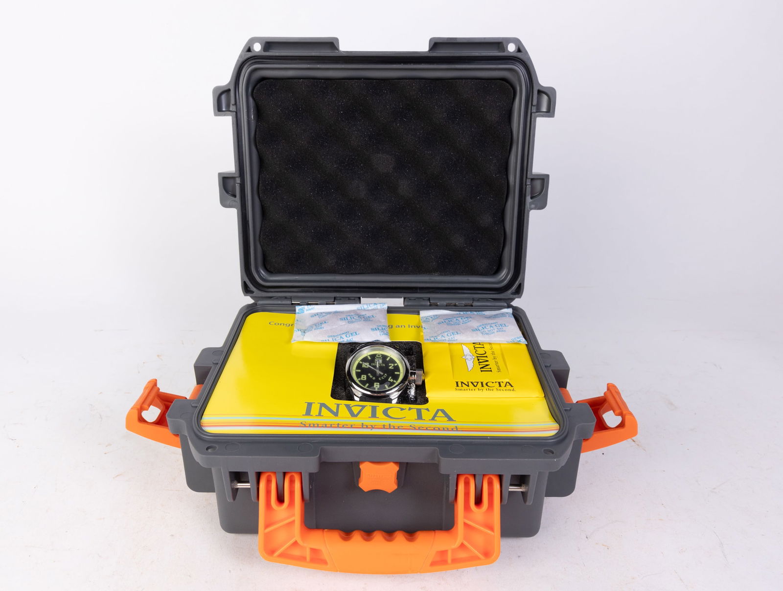 Invicta Pro Diver Men's Watch in Hard Case: Invicta Pro Diver Men's Watch in Hard Case, model #4342, stainless steel and polyurethane, Swiss Quartz movement, 100m water resistance Size 10" x 12" x 6" Literature Brooks Auction is not responsibl