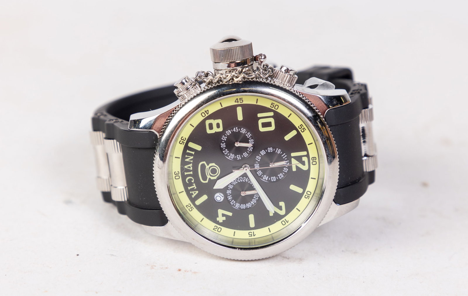 Invicta Russian 1959 Diver Men's Watch: Invicta Russian 1959 Diver Men's Watch, Trinite Night Glow, Japan Quartz movement, 100m water resistance, stainless steel with polyurethane band Size 6" x 6" x 6" Literature Brooks Auction is not res