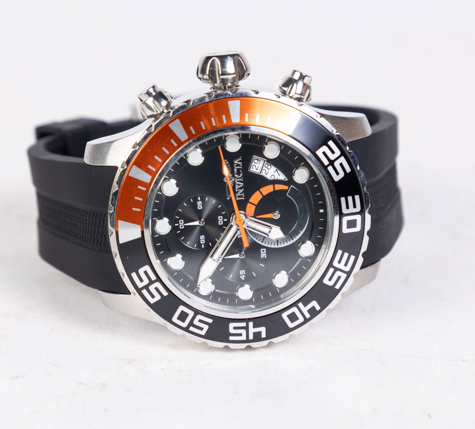 Invicta Pro Diver Men's Watch: Invicta Pro Diver Men's Watch, model #20448, stainless steel with polyurethane band, Japan Quartz movement, 100m water resistance Size 6" x 6" x 6" Literature Brooks Auction is not responsible for ou