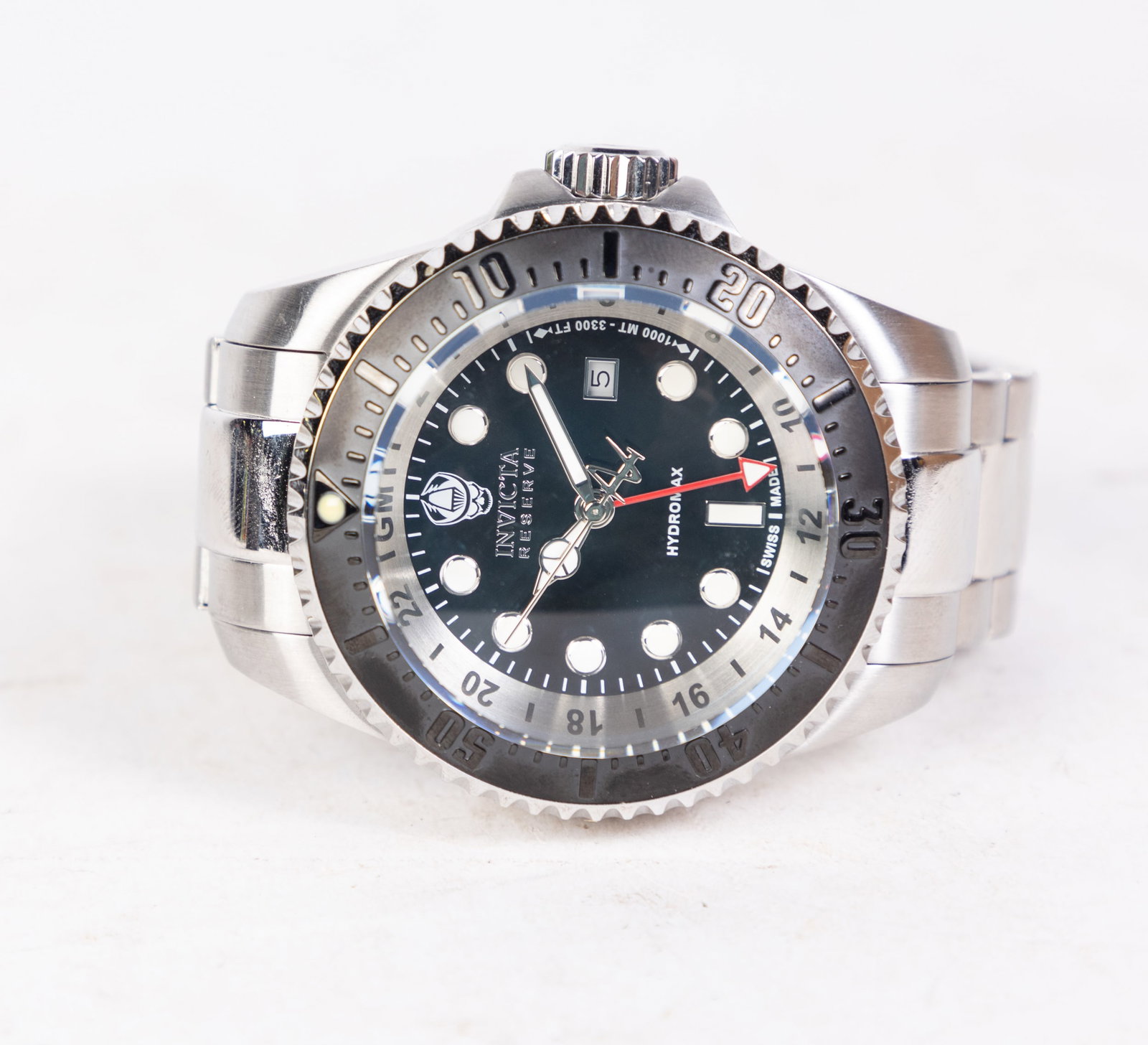 Invicta Hydromax Men's Watch: Invicta Hydromax Men's Watch, model #16966, stainless steel, Swiss Quartz movement, 1000m water resistance Size 6" x 6" x 6" Literature Brooks Auction is not responsible for outbids. Questions? Call