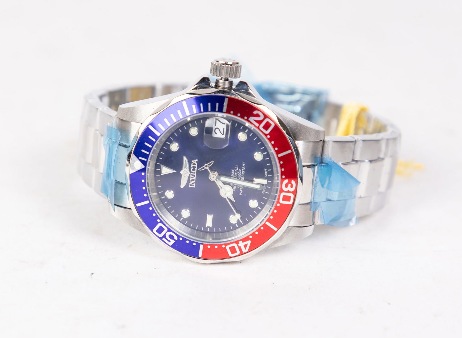 Invicta Pro Diver Men's Watch: Invicta Pro Diver Men's Watch, model #5053, stainless steel, Japan Automatic movement, 200m water resistance Size 6" x 6" x 6" Literature Brooks Auction is not responsible for outbids. Questions? Ca