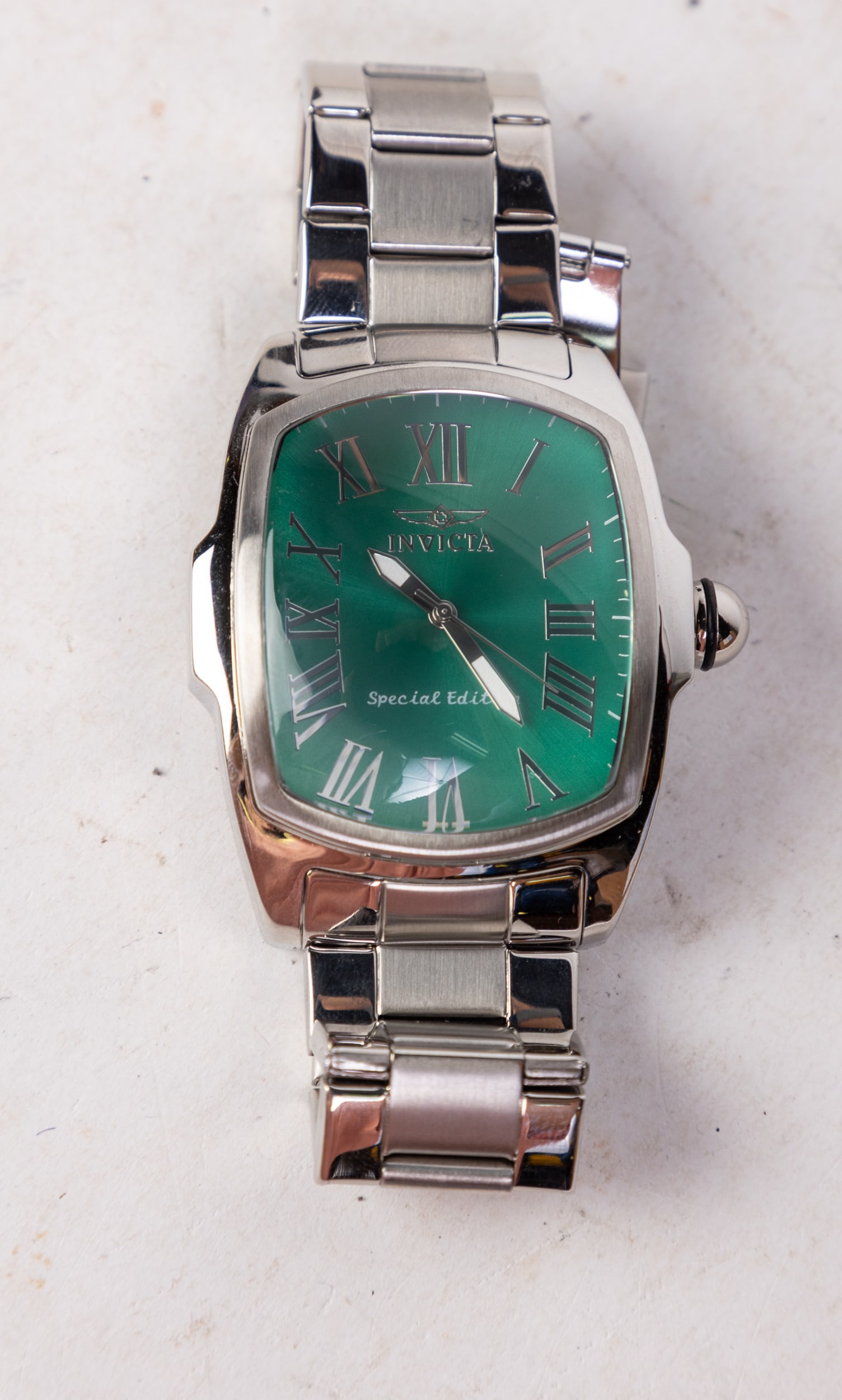 Invicta Lupah Men's Watch: Invicta Lupah Men's Watch, model #18655, stainless steel, Japan Quartz movement, 30m water resistance Size 6" x 6" x 6" Literature Brooks Auction is not responsible for outbids. Questions? Call the