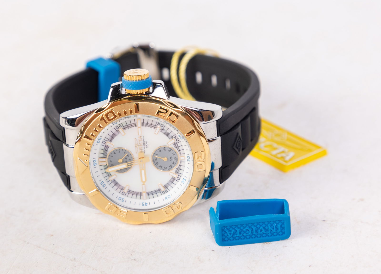 Invicta Pro Diver Men's Watch: Invicta Pro Diver Men's Watch, model #13799, stainless steel with polyurethane band, Japan Quartz movement, 100m water resistance Size 6" x 6" x 6" Literature Brooks Auction is not responsible for ou