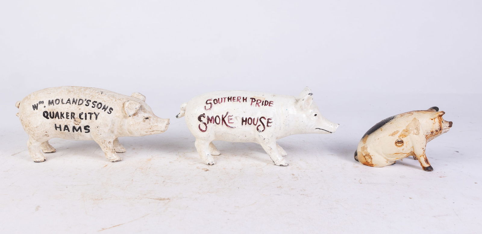 Three Cast Iron Pig Banks (1 of 4)