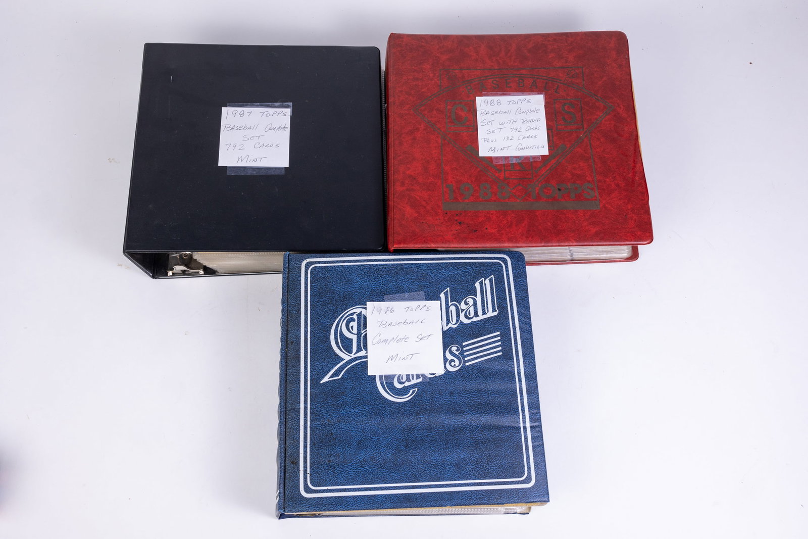 Four Baseball Sets in Binders: Four Baseball Sets in Binders, all sets mint condition: 1986 Topps - 1987 Topps - 1988 Topps - 1988 Topps Traded Size 12" x 12" x 3" Literature Brooks Auction is not responsible for outbids. Questio