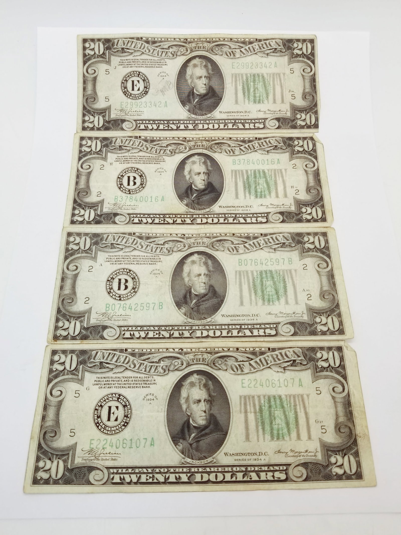 Seven Series 1934A 20 Dollar Bills: (7) Series 1934A 20 Dollar Bills Literature Brooks Auction is not responsible for outbids. Questions? Call the office at (856) 694-2960 or email us directly at info@brooks.auction. • Please rea