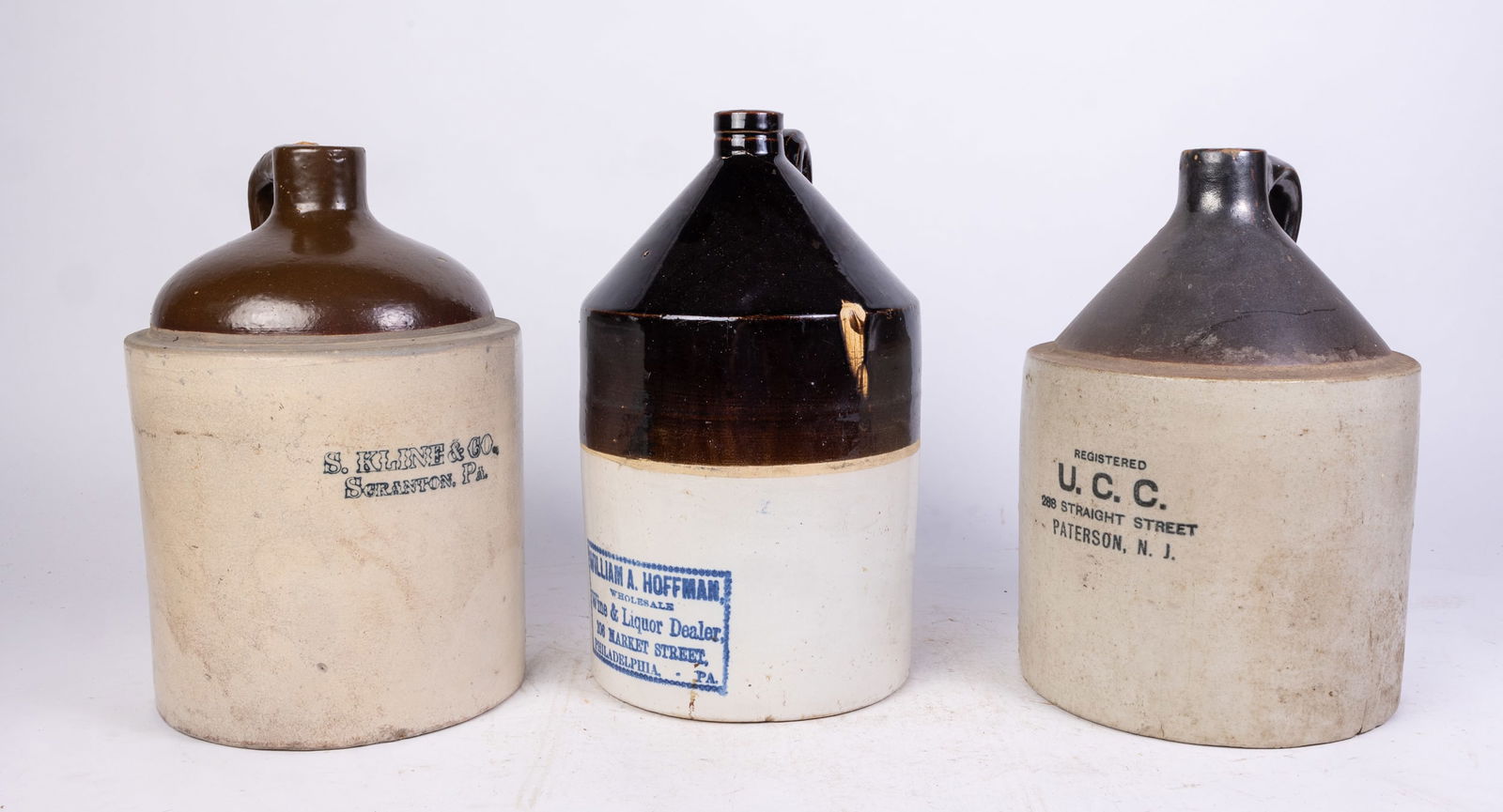 Three Advertising Stoneware Jugs (1 of 6)