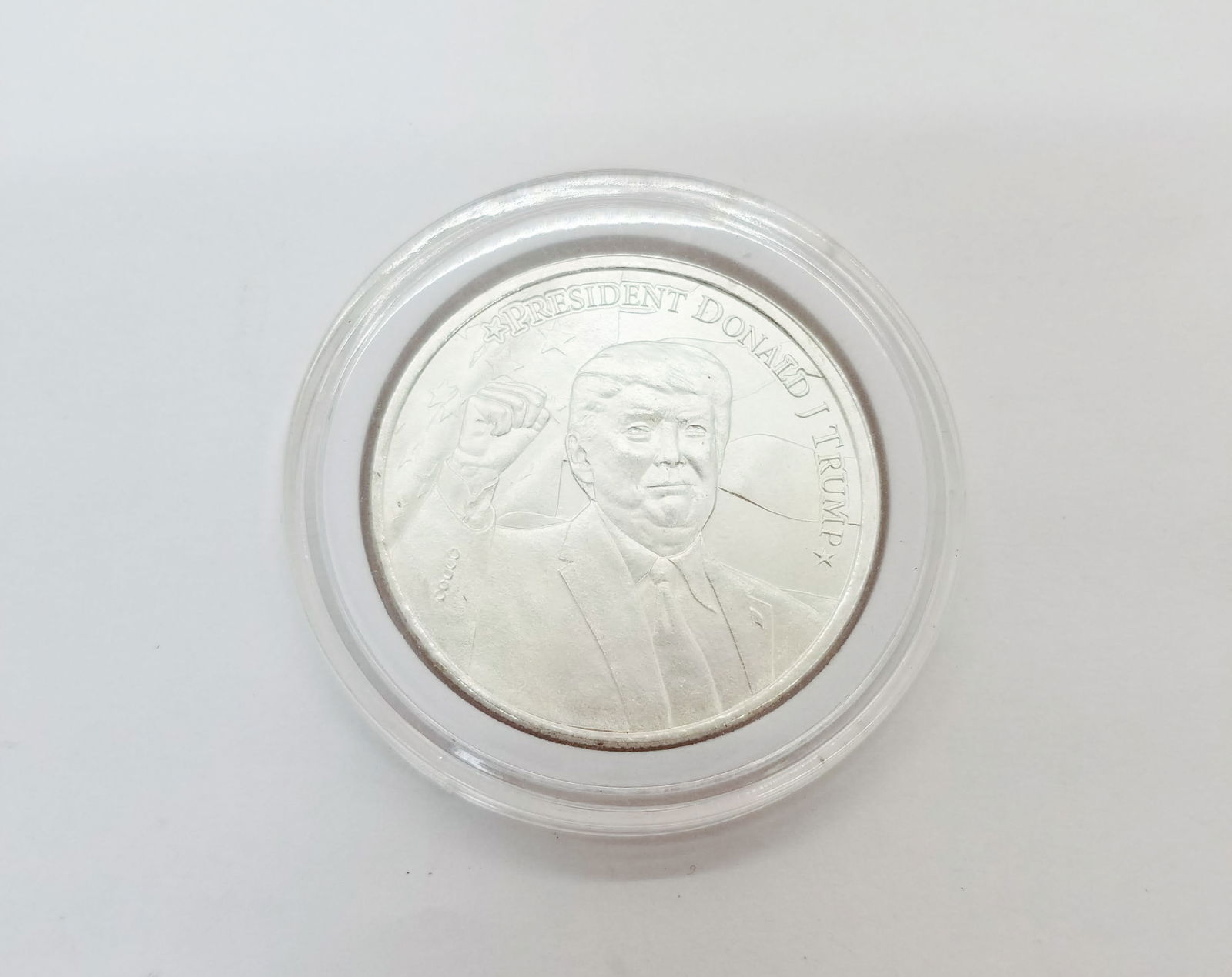 President Donald Trump 1 Ounce Fine Silver Round: President Donald Trump 1 Ounce Fine Silver Round, .9999 silver, 2020 Literature Brooks Auction is not responsible for outbids. Questions? Call the office at (856) 694-2960 or email us directly at inf