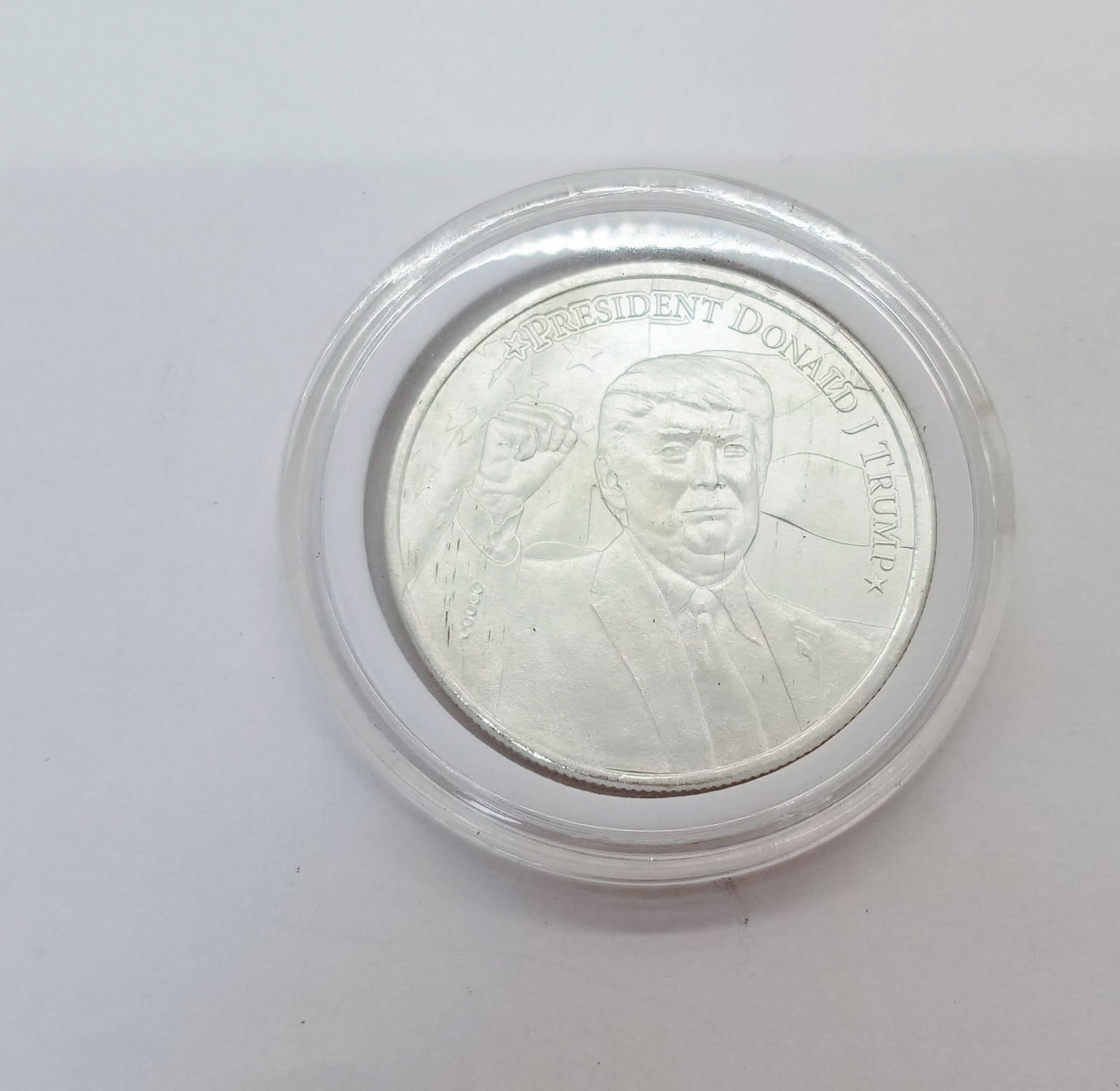 President Donald Trump 1 Ounce Fine Silver Round: President Donald Trump 1 Ounce Fine Silver Round, .9999 silver, 2020 Literature Brooks Auction is not responsible for outbids. Questions? Call the office at (856) 694-2960 or email us directly at inf