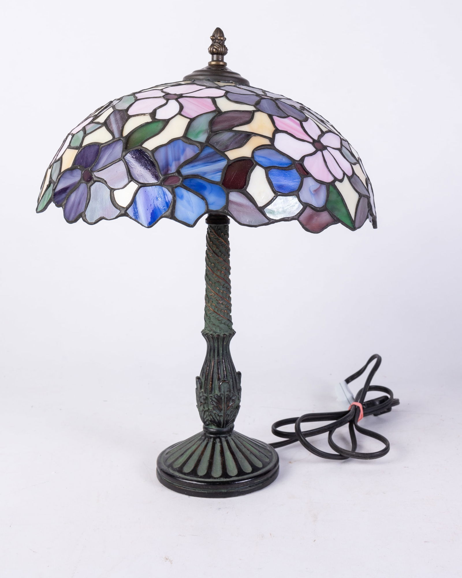 Small Leaded Glass Tiffany Style Table Lamp: Small Leaded Glass Tiffany Style Table Lamp Size 18" x 12" x 12" Literature Brooks Auction is not responsible for outbids. Questions? Call the office at (856) 694-2960 or email us directly at info@b