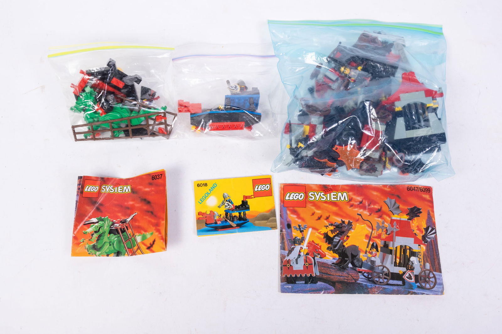 Three Lego Sets: Three Lego Sets: Lego 6047/6099 Traitor Transport - Lego 6037 Witch's Windship - Lego 6018 Battle Dragon Size 7" x 12" x 12" Literature Brooks Auction is not responsible for outbids. Questions? Call