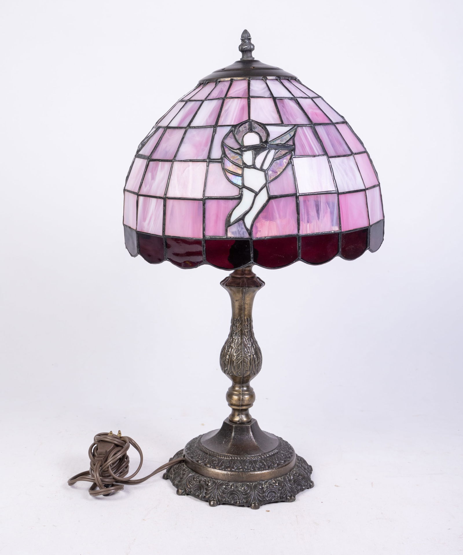 Leaded Slag Glass Lamp with Cherub Motif: Leaded Slag Glass Lamp with Cherub Motif Size 19" x 13" x 13" Literature Brooks Auction is not responsible for outbids. Questions? Call the office at (856) 694-2960 or email us directly at info@broo
