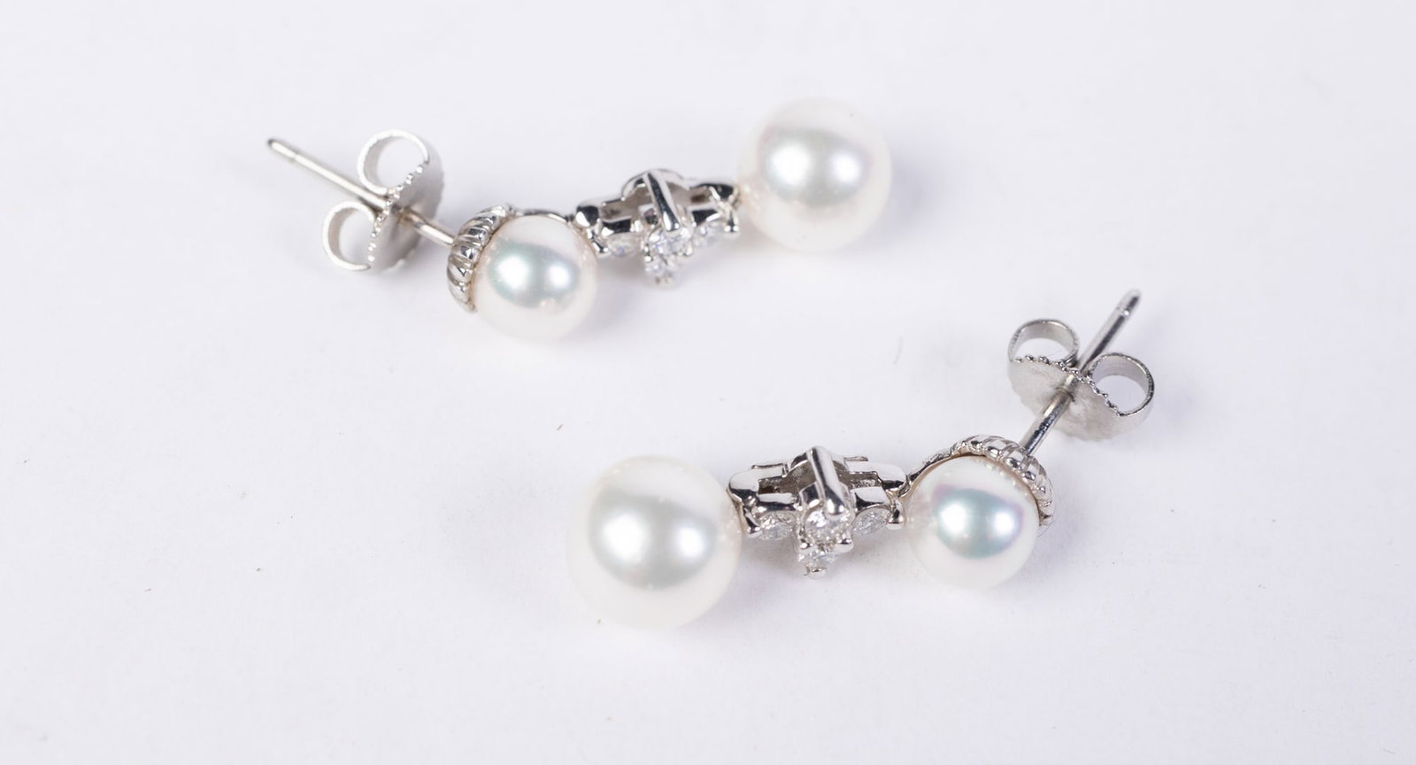 Platinum Pearl & Diamond Drop Earrings: Platinum Pearl & Diamond Drop Earrings, .21cts tw, 7.50mm & 6.00 Akoya cultured pearl measurements Literature Brooks Auction is not responsible for outbids. Questions? Call the office at (856) 694-296