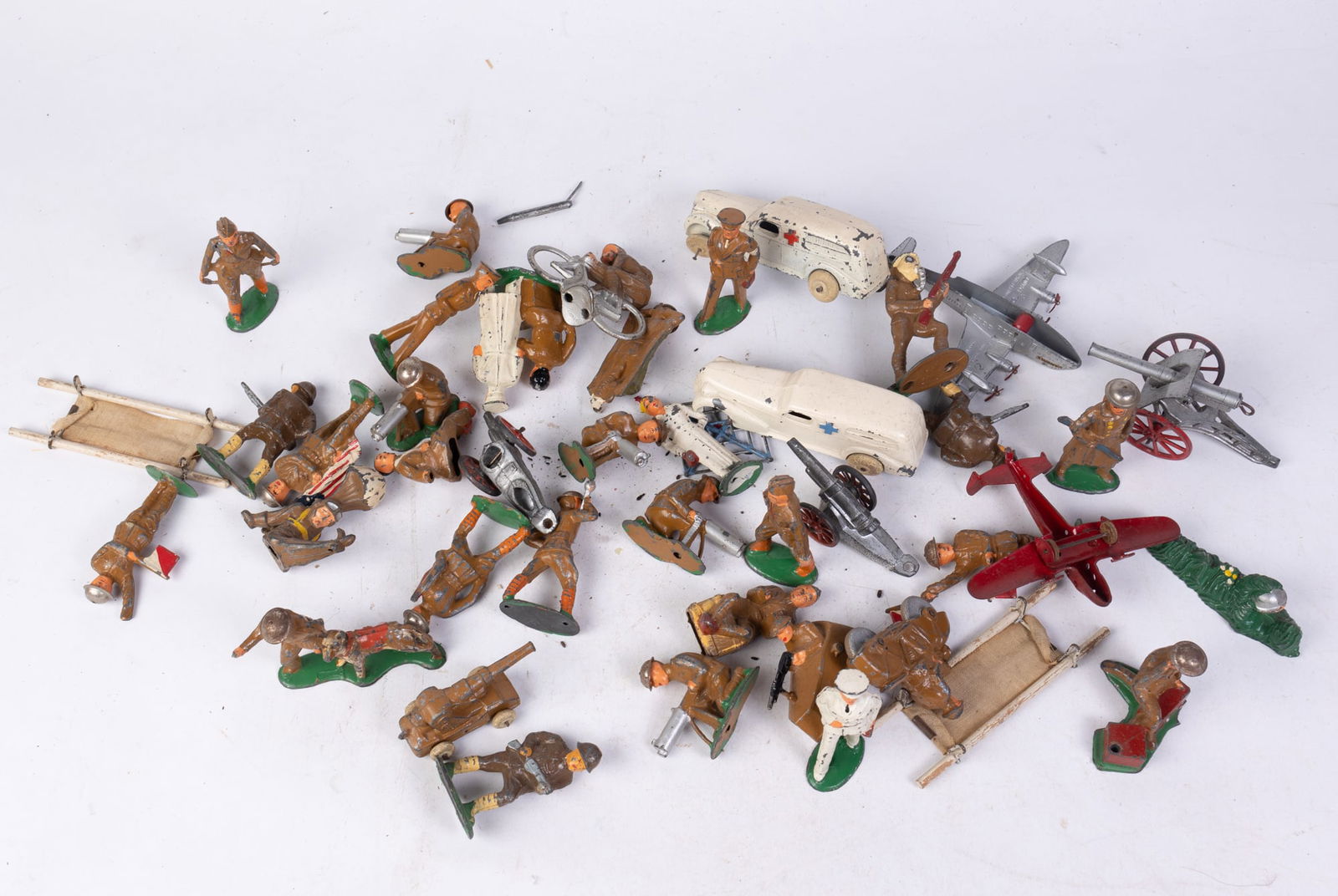 Vintage Lead Figurines: Vintage Lead Figurines Size 7" x 12" x 12" Literature Brooks Auction is not responsible for outbids. Questions? Call the office at (856) 694-2960 or email us directly at info@brooks.auction.