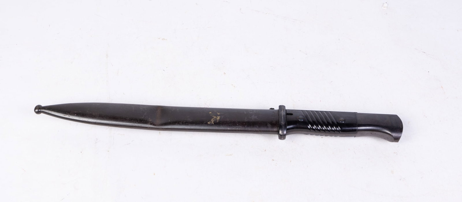 41ASW Bayonet: 41ASW Bayonet, dent in sheath Size 16" x 2" x 1" Literature Brooks Auction is not responsible for outbids. Questions? Call the office at (856) 694-2960 or email us directly at info@brooks.auction.
