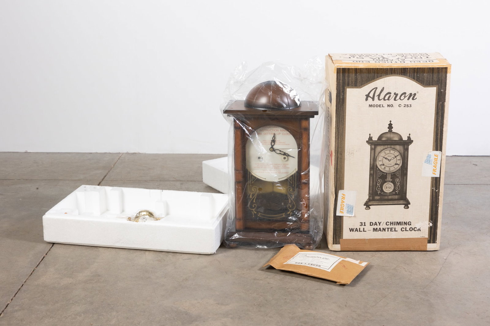 Alaron Model No. C-253 31 Day Chiming Mantel Clock: Alaron Model No. C-253 31 Day Chiming Mantel Clock Size 20" x 12" x 8" Literature Brooks Auction is not responsible for outbids. Questions? Call the office at (856) 694-2960 or email us directly at