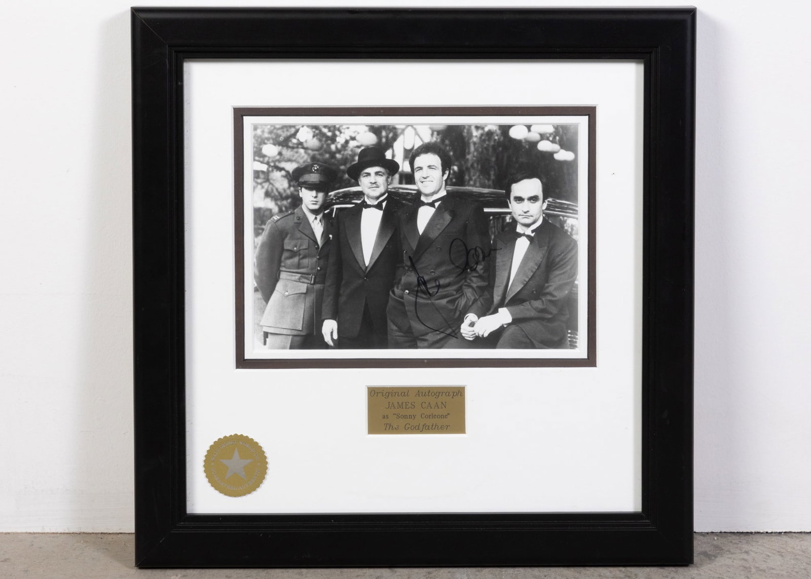 Framed Photograph of James Caan as Sonny Corleone with Autograph: Framed Photograph of James Caan as Sonny Corleone with Autograph Size 16" x 16" Literature Brooks Auction is not responsible for outbids. Questions? Call the office at (856) 694-2960 or email us dir
