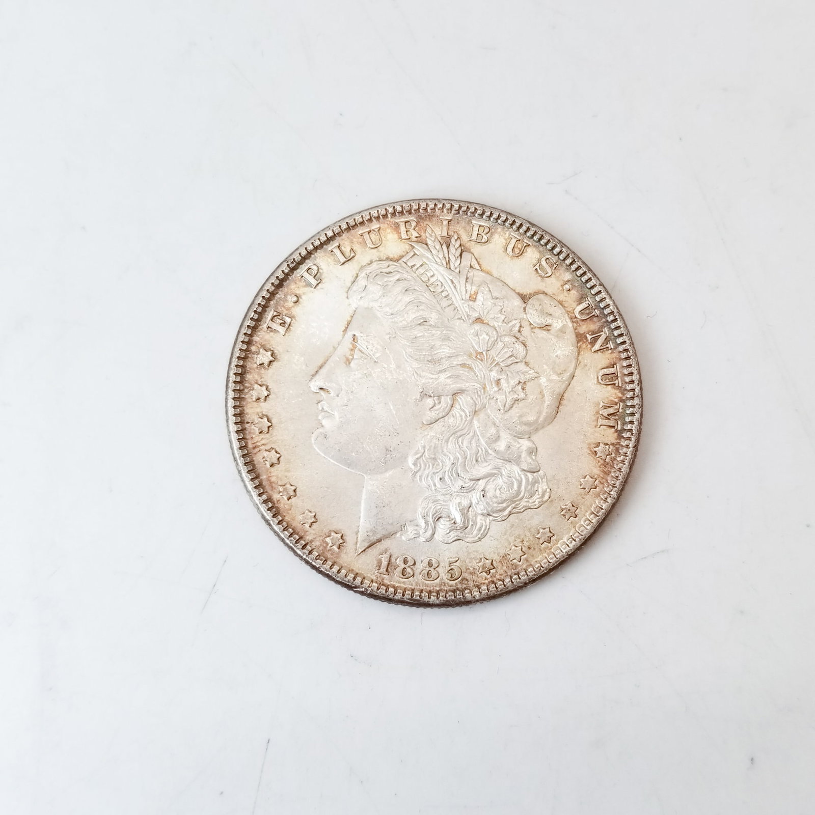 1885 Morgan Dollar: 1885 Morgan Dollar Literature Brooks Auction is not responsible for outbids. Questions? Call the office at (856) 694-2960 or email us directly at info@brooks.auction. • Please read descriptions 