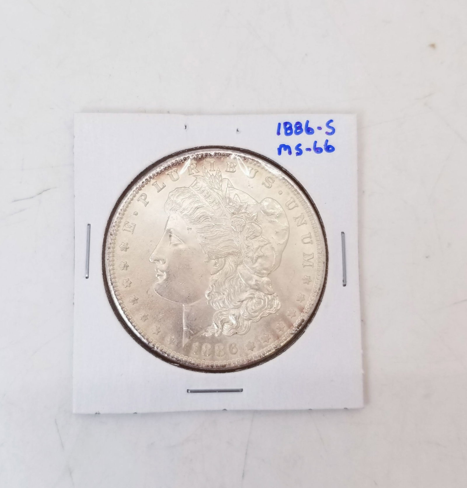 1886S Morgan Dollar: 1886S Morgan Dollar, MS66 Literature Brooks Auction is not responsible for outbids. Questions? Call the office at (856) 694-2960 or email us directly at info@brooks.auction. • Please read descri