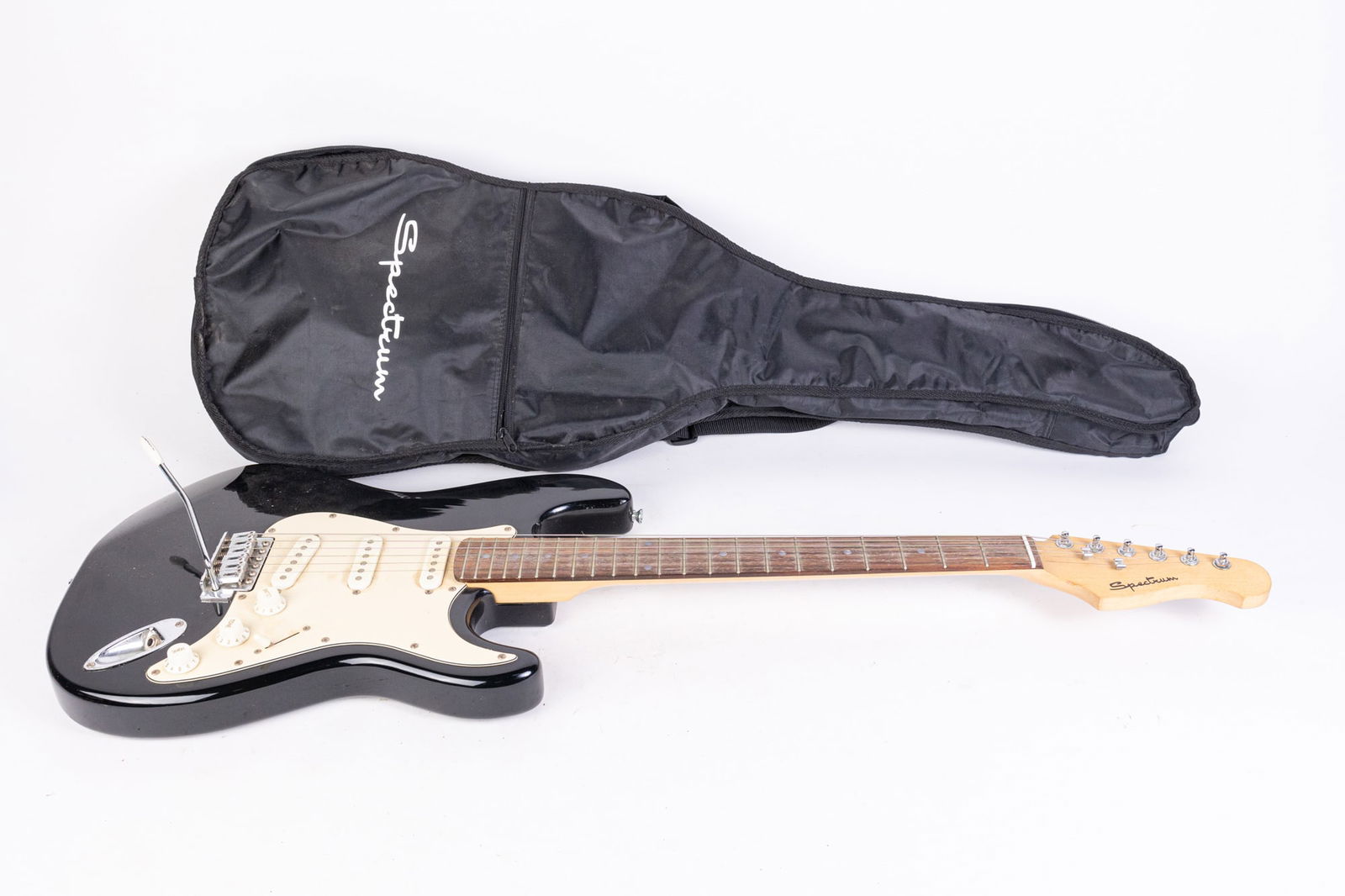 Spectrum Electric Guitar in Soft Case: Spectrum Electric Guitar in Soft Case Size 39" x 13" Literature Brooks Auction is not responsible for outbids. Questions? Call the office at (856) 694-2960 or email us directly at info@brooks.auctio