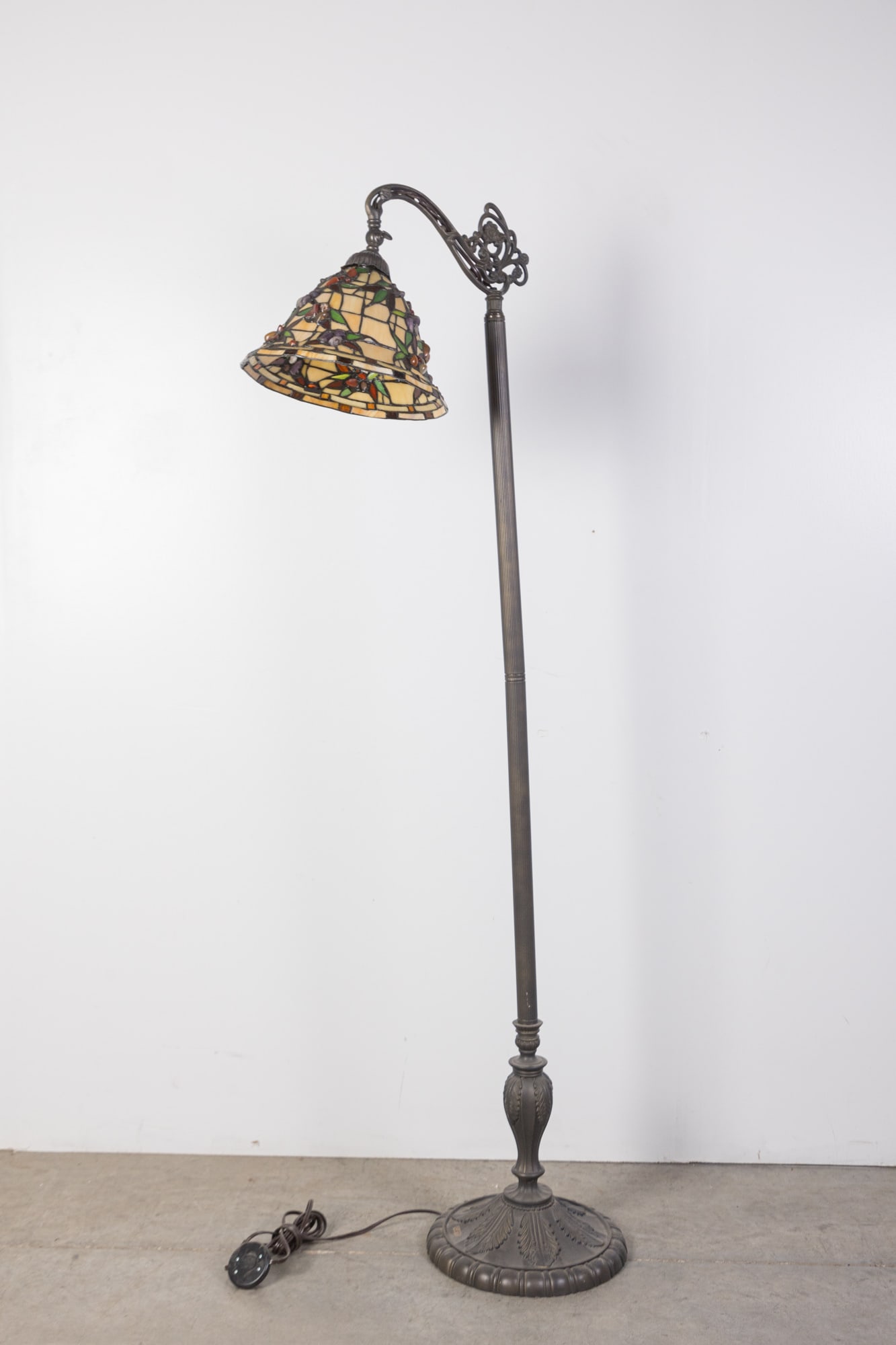 Leaded Slag Glass Floor Lamp: Leaded Slag Glass Floor Lamp, floral motif Size 63" x 12" x 18" Literature Brooks Auction is not responsible for outbids. Questions? Call the office at (856) 694-2960 or email us directly at info@br