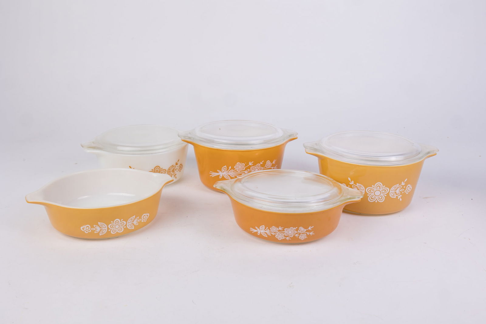 Pyrex Golden Butterfly Assorted Pieces: Pyrex Golden Butterfly Assorted Pieces, includes lids! Size 7" x 12" x 12" Literature Brooks Auction is not responsible for outbids. Questions? Call the office at (856) 694-2960 or email us directly